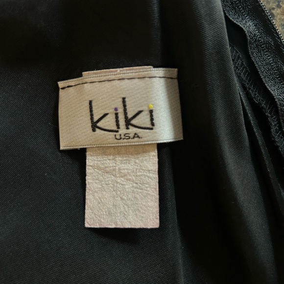 Long black dress with rosette trim across bust. - Picture 5 of 5